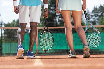 image_two-tennis-players-are-standin Tennis in Lorraine Lakes Lakewood Ranch